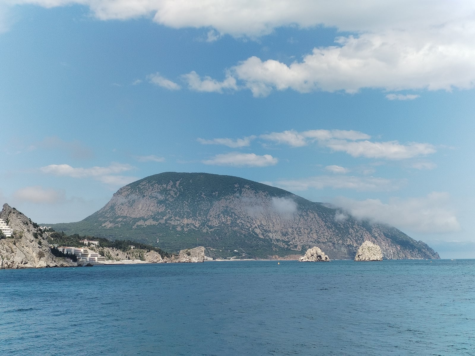 Sea cliff with a view of the village