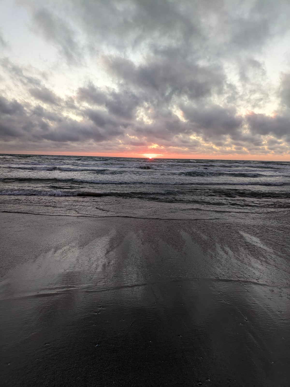 Sunset at sea with clouds